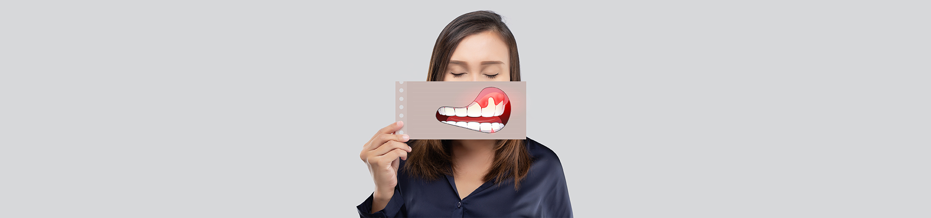 A dentist engaged in periodontal treatment, focusing on a patient's mouth, surrounded by dental tools in a clinical setting at New Smile Dentistry.